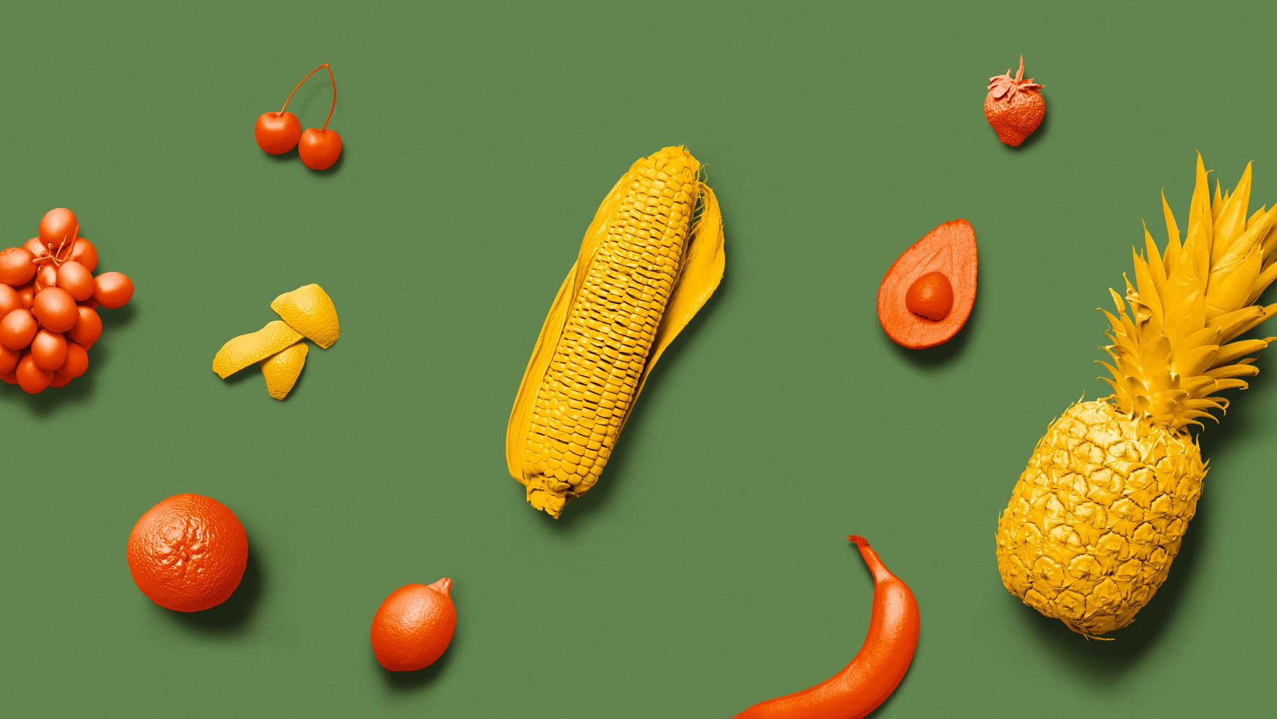Fruits and vegetables against green background